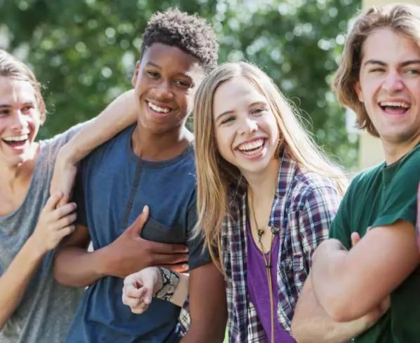 Young people smiling ahead