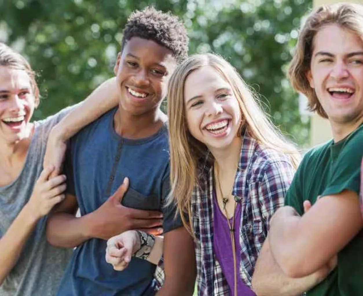 Young people smiling ahead